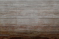 Faded brown corduroy fabric textured background