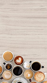 Coffee mugs on a light beige wooden textured background