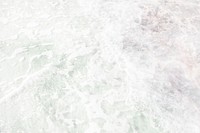 Foam on the ocean textured backdrop