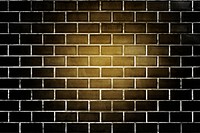 Yellow light on a black brick wall textured background