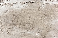 Bright beige sand textured background