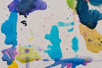 Colorful paint on a kraft paper background