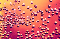 Fizzy drink forming bubbles background