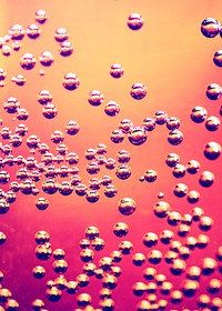 Fizzy drink forming bubbles background