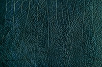 Blue creased leather textured background