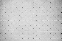 Gray brick wall with dots textured background