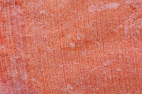Red stained textured paper background