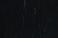 Black scratched textured paper background