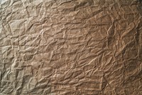 Grungy crumpled textured paper background