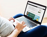 Woman checking out free design resources at a website