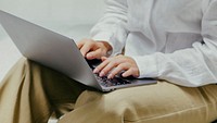 Woman working from home on her laptop