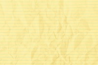 Yellow crumpled lined paper background
