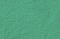 Crumpled mint green paper textured background