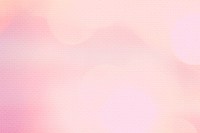 Salmon pink bokeh patterned background