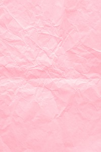Crumpled flamingo pink paper textured background