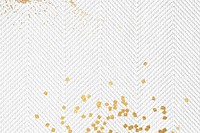 Gold glitter on a white fabric textured background