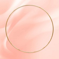 Round gold frame on an old rose pink background