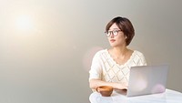 Asian woman using a laptop