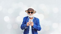 Elderly man is using mobile phone