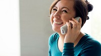 Cheerful woman talking on the phone