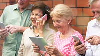 Group of diverse elderly using digital devices