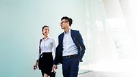 Cheerful Asian couple walking together