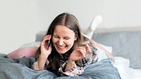 Cheerful woman enjoying her phone call