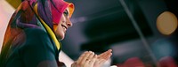 Muslim woman clapping her hand in a meeting