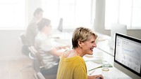 Middle aged woman working on a computer