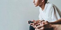 Young man playing a video game