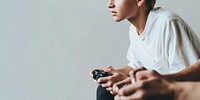 Young man playing a video game