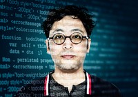 Asian hacker with computer code on his glasses