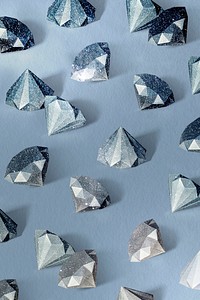 Blue paper craft diamond patterned background