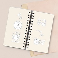 Notebook mockup with coffee stickers