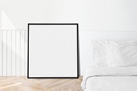 Picture frame mockup in a bedroom