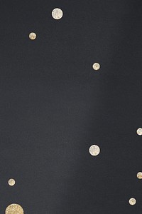 Gold dotted pattern on a black background