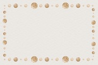 Gold dot patterned frame on a beige background