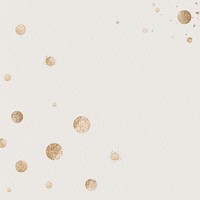 Gold dotted pattern on a beige background