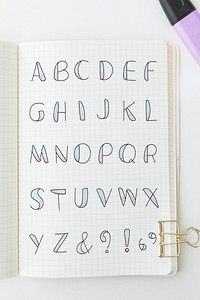The Alphabet on a notebook page mockup