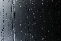 Rain drops on glass textured background 
