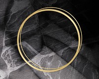 Golden framed circle on a marble texture