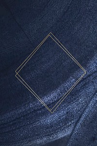 Golden framed rhombus on a blue textured vector
