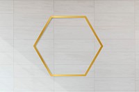 Golden framed hexagon on a tile textured vector