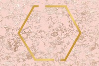Golden framed hexagon on a pink texture