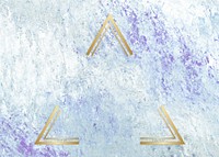 Gold triangle frame on a blue abstract patterned background