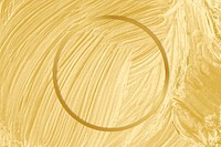 Gold round frame on a yellow paintbrush stroke patterned background