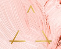 Gold triangle frame on a pastel pink paintbrush stroke patterned background