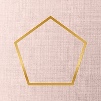 Gold pentagon frame on a peach fabric background