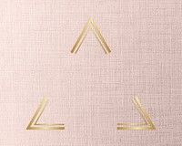 Gold triangle frame on a peach fabric background illustration
