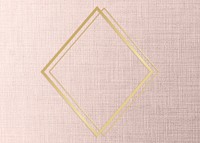 Gold rhombus frame on a peach fabric background